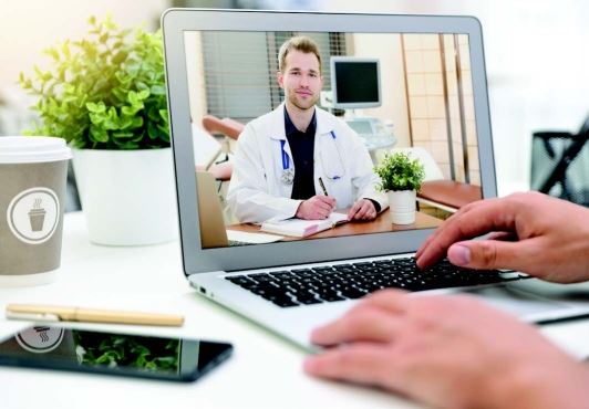 doctor on a telehealth consultation on a laptop